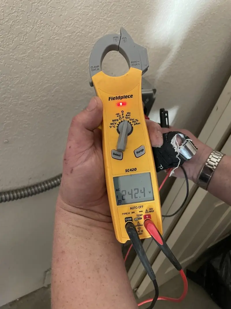 Voltage testing with clamp meter during Generator Installation in South Haven